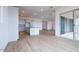 Open living space with kitchen and access to patio at 876 W Golden Ore Pass, Apache Junction, AZ 85120