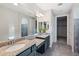Modern primary bathroom with dual sinks and granite countertops at 27478 W Tonopah Dr, Buckeye, AZ 85396