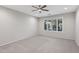Bright bedroom with natural light and carpet flooring at 27478 W Tonopah Dr, Buckeye, AZ 85396