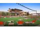 Outdoor games area with seating and string lights at 27478 W Tonopah Dr, Buckeye, AZ 85396