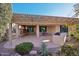 Enjoy the outdoors on this extended, covered patio with lush backyard landscaping at 27478 W Tonopah Dr, Buckeye, AZ 85396