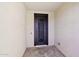 Stylish front door offers a welcoming entrance to the home at 27478 W Tonopah Dr, Buckeye, AZ 85396