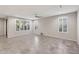 Spacious living room with natural light and tile flooring at 27478 W Tonopah Dr, Buckeye, AZ 85396