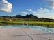 Infinity pool with mountain views at 27478 W Tonopah Dr, Buckeye, AZ 85396