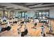 Modern spin studio with numerous bikes and large mirrors at 27478 W Tonopah Dr, Buckeye, AZ 85396