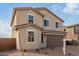 A close exterior shot of a two-story home's front and garage area at 9042 N 116Th Ln, Youngtown, AZ 85363