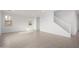 Spacious living room with lots of natural light and tile flooring at 9042 N 116Th Ln, Youngtown, AZ 85363