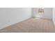 Empty bedroom with neutral carpeting and window at 16620 N Dante Way, Maricopa, AZ 85138