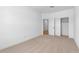 Empty bedroom featuring neutral carpeting, closet with sliding doors, and natural light at 16620 N Dante Way, Maricopa, AZ 85138
