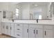 Bright bathroom featuring a double vanity and modern black fixtures at 28266 N 134Th Dr, Peoria, AZ 85383