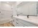 Stylish bathroom featuring double vanity, modern fixtures, and a shower-tub combo at 28266 N 134Th Dr, Peoria, AZ 85383