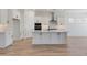 Spacious kitchen with a large island, stainless steel appliances, and ample cabinet space at 28266 N 134Th Dr, Peoria, AZ 85383