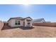 This home features a spacious backyard with room for entertaining at 16610 N Dante Way, Maricopa, AZ 85138