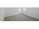 Neutral bedroom with carpet, one window, and white walls providing plenty of natural light at 16610 N Dante Way, Maricopa, AZ 85138