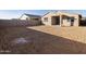 Large backyard with a view of the house at 9145 N 173Rd Ln, Waddell, AZ 85355