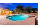 Private backyard with a sparkling pool, mature trees, and comfortable patio seating areas for outdoor living at 13108 N 76Th St, Scottsdale, AZ 85260