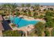 Overhead image of community pool, lounge chairs, palm trees, and lush landscaping at 22446 E Russet Rd, Queen Creek, AZ 85142