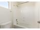 Bathroom featuring shower/tub combo with white tile and chrome fixtures at 4102 S 186Th Ave, Goodyear, AZ 85338