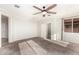 Bright bedroom with plush carpeting, trim and generous natural light at 4102 S 186Th Ave, Goodyear, AZ 85338