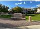 View of Townes at South Park's sign surrounded by greenery and well-maintained landscaping at 500 N Roosevelt Ave # 92, Chandler, AZ 85226