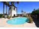 Sparkling community pool featuring a tiled pool and clear blue skies at 6701 N Scottsdale Rd # 20, Scottsdale, AZ 85250