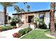 Charming home with a tile roof, landscaped yard, and inviting entryway at 6701 N Scottsdale Rd # 20, Scottsdale, AZ 85250