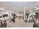 Well-equipped fitness center with cardio machines and free weights for a complete workout at 6701 N Scottsdale Rd # 20, Scottsdale, AZ 85250