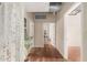 Hallway with wood floors and doors leading to other rooms at 114 W Adams St # 506, Phoenix, AZ 85003
