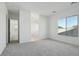 Bright bedroom with bathroom access and carpet flooring at 11458 E Utah Ave, Mesa, AZ 85212