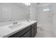 Bathroom features a double vanity, toilet, and shower/bathtub combination at 17626 W Oregon Ave, Litchfield Park, AZ 85340