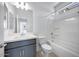 Bathroom features a shower and bathtub combination, toilet, and vanity at 17626 W Oregon Ave, Litchfield Park, AZ 85340
