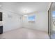 Bright dining room featuring tile floors, modern chandelier, and sliding door access to the backyard at 17626 W Oregon Ave, Litchfield Park, AZ 85340