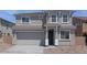 Charming two-story home featuring neutral paint, a two-car garage, and a covered front porch at 17626 W Oregon Ave, Litchfield Park, AZ 85340