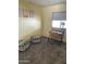 Inviting bedroom showcasing plush carpeting, a desk by the window, and plenty of space for personalized touches at 9427 E University Dr # 46, Mesa, AZ 85207