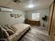 Relaxing bedroom with a comfortable bed, wooden dresser, and minimalist decor at 9427 E University Dr # 46, Mesa, AZ 85207