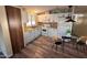 Cozy kitchen featuring white cabinets and modern appliances at 9427 E University Dr # 46, Mesa, AZ 85207