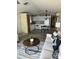 Modern living room with a view into the kitchen, featuring sleek furniture and stylish decor at 9427 E University Dr # 46, Mesa, AZ 85207