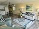 Inviting living room featuring stylish furniture, a cozy rug, and modern decor at 9427 E University Dr # 46, Mesa, AZ 85207