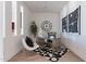 Modern office space with stylish decor, unique accents, and plenty of natural light creating a serene workspace at 23978 S 218Th Pl, Queen Creek, AZ 85142