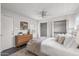Bright bedroom featuring closet space, ceiling fan, and natural light at 1325 E Monte Vista E Rd, Phoenix, AZ 85006