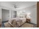 Cozy bedroom with plush carpet, a ceiling fan, and ample closet space at 1325 E Monte Vista E Rd, Phoenix, AZ 85006