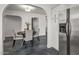 Dining area with access to the kitchen and view to the adjacent rooms at 1325 E Monte Vista E Rd, Phoenix, AZ 85006