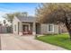 Quaint one-story home with a covered porch, lawn, and mature shade tree at 1325 E Monte Vista E Rd, Phoenix, AZ 85006