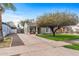 Charming home with a large tree in the front yard at 1325 E Monte Vista E Rd, Phoenix, AZ 85006