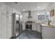 Bright kitchen featuring stainless steel appliances, white cabinetry, and granite countertops at 1325 E Monte Vista E Rd, Phoenix, AZ 85006