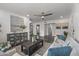 Bright living room with modern decor, a ceiling fan, and stylish furniture at 1325 E Monte Vista E Rd, Phoenix, AZ 85006