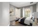 Serene main bedroom featuring soft decor, with a dresser and natural light at 1325 E Monte Vista E Rd, Phoenix, AZ 85006