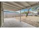 Covered patio offering backyard views, with block wall and mature tree at 1325 E Monte Vista E Rd, Phoenix, AZ 85006