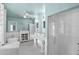 An open and airy bathroom with dual sinks, a standalone tub, and a large glass enclosed shower at 1820 N 7Th Ave, Phoenix, AZ 85007