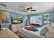 Bedroom featuring a ceiling fan, golf art and a comfortable bed at 1820 N 7Th Ave, Phoenix, AZ 85007